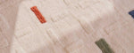 Detailed zoom of the Brick washable wool rug showcasing its textured weave and rustic warmth for modern kids' rooms.