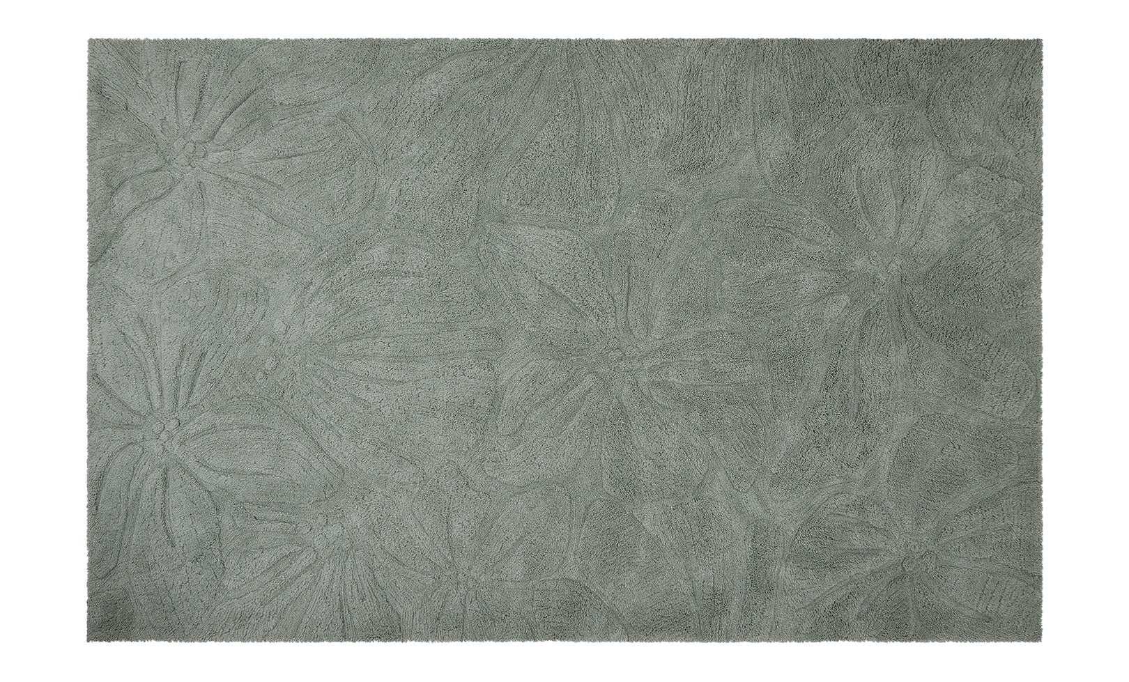 Colorful floral field rug made from safe, washable wool, designed to brighten up nurseries and play spaces.