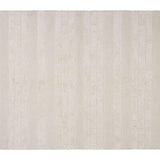 Soft neutral Nest area rug designed for safe toddler play, crafted with non-toxic, washable fibers and subtle geometric lines.