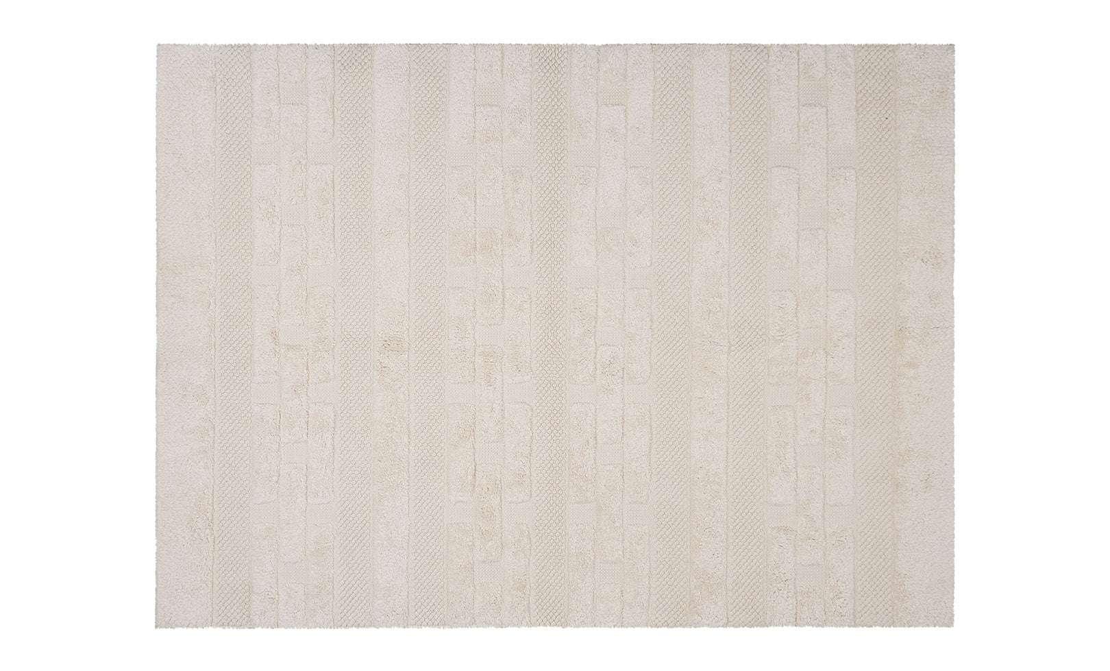 Soft neutral Nest area rug designed for safe toddler play, crafted with non-toxic, washable fibers and subtle geometric lines.
