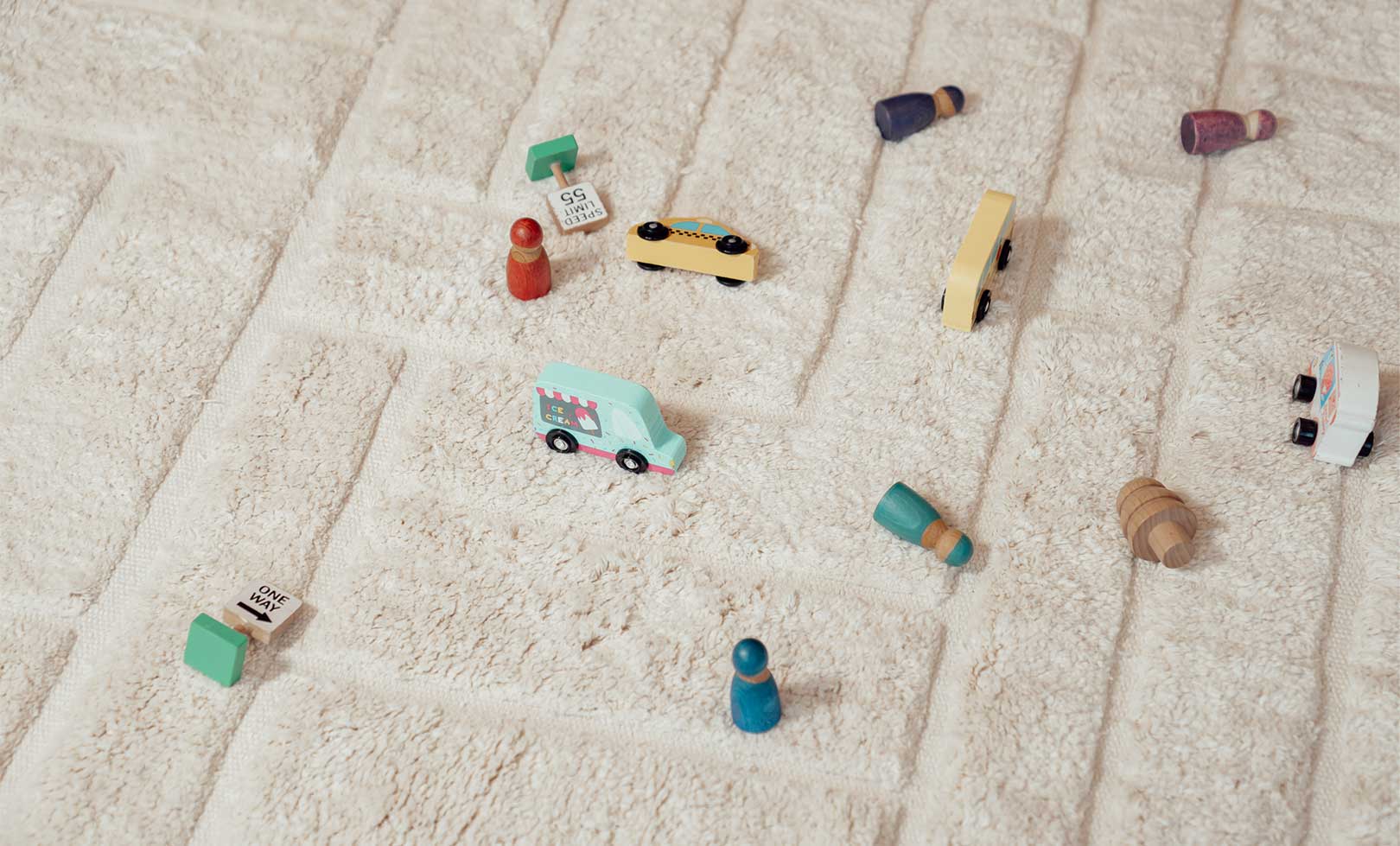 Washable cotton nursery rug with a soft pathways pattern in soothing neutral tones, ideal for calm and cozy spaces.