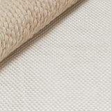 Medium-sized screenshot featuring the Sage & Wild Living website layout, highlighting eco-friendly rug options.