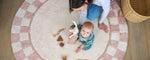 Checker 1 nursery rug with a classic black-and-white pattern, made from non-toxic and organic washable materials.