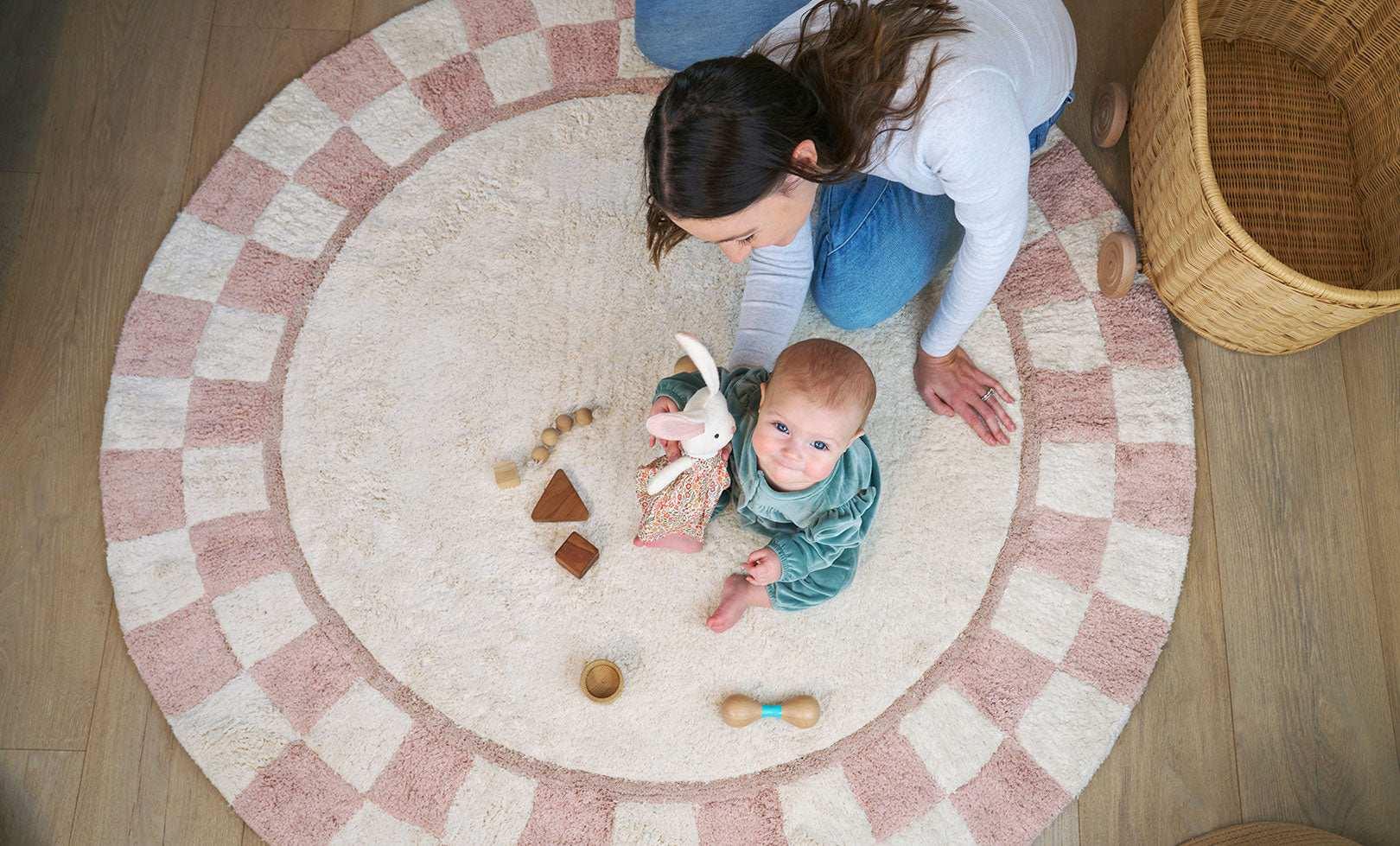 Checker 1 nursery rug with a classic black-and-white pattern, made from non-toxic and organic washable materials.