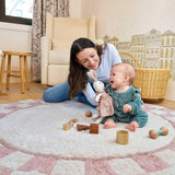 Organic and non-toxic washable nursery rug with a modern checkerboard design in soft neutral shades.