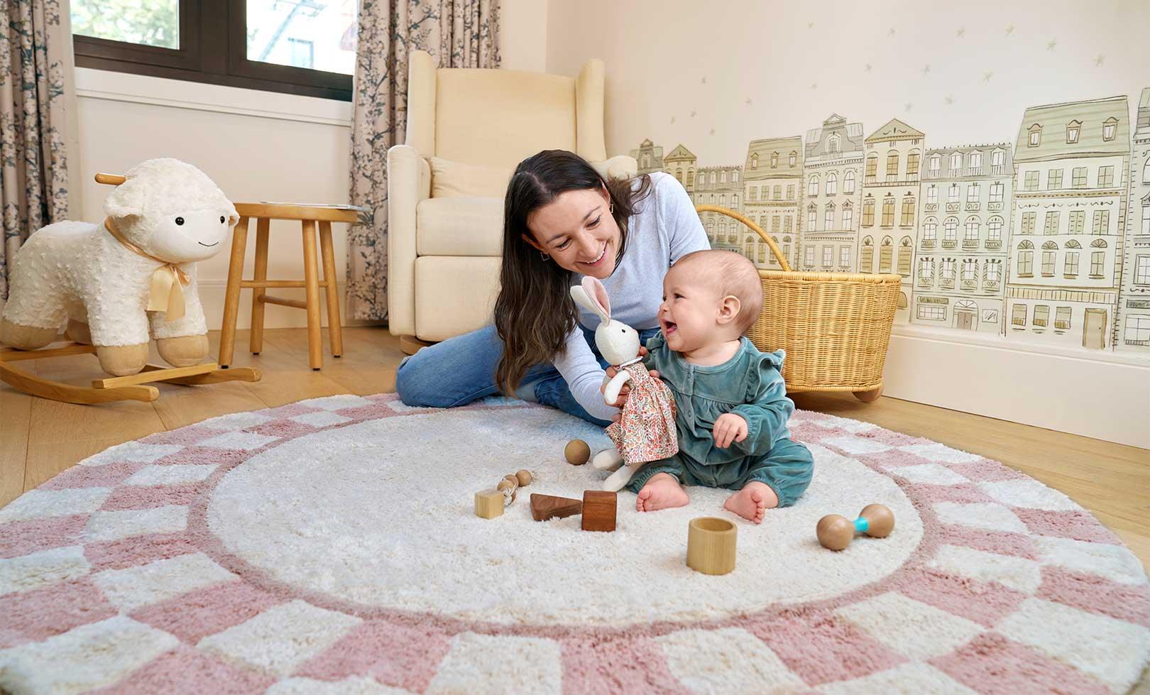 Organic and non-toxic washable nursery rug with a modern checkerboard design in soft neutral shades.