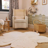 Delicate floral wool rug with pastel blooms, blending softness and practicality for stylish nursery decor.