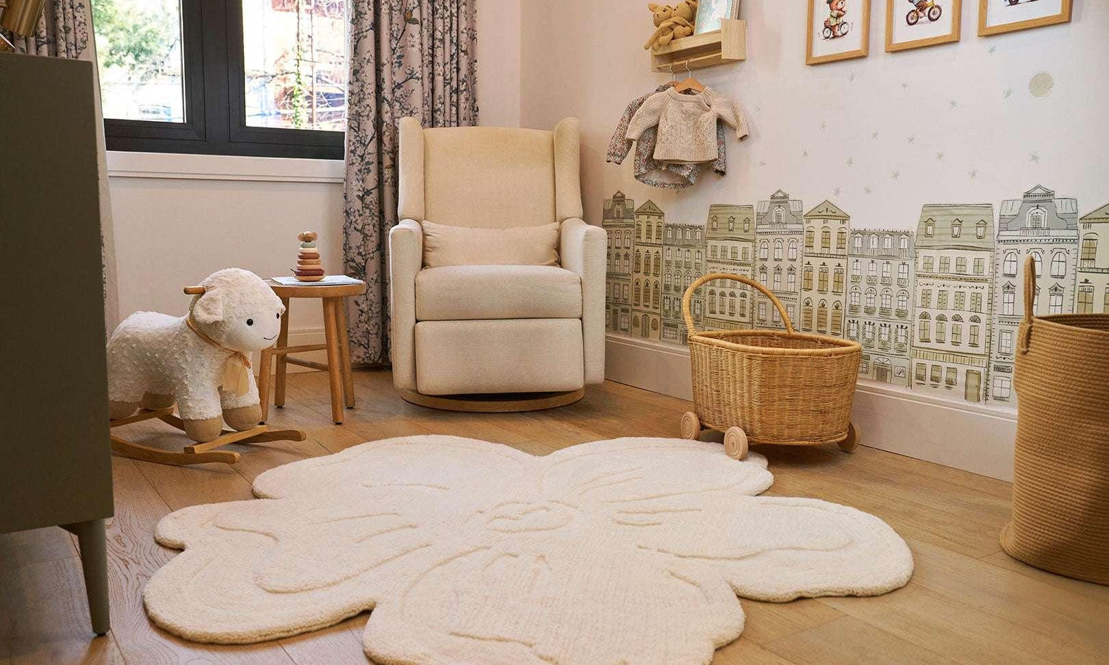 Delicate floral wool rug with pastel blooms, blending softness and practicality for stylish nursery decor.
