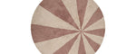 Washable wool children’s rug featuring a pink pinwheel design, combining softness with playful charm.